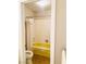 Retro yellow bathroom with shower/tub combo at 3690 S Rosecrest Cir, Las Vegas, NV 89121