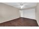 This is an empty bedroom with wood-look flooring and a closet at 3690 S Rosecrest Cir, Las Vegas, NV 89121