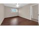 This bedroom has wood-look flooring and a window with a view at 3690 S Rosecrest Cir, Las Vegas, NV 89121