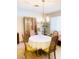 Formal dining room with a chandelier and wood table at 3690 S Rosecrest Cir, Las Vegas, NV 89121