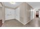 Inviting entryway featuring ceramic tile flooring and a double door entry at 3690 S Rosecrest Cir, Las Vegas, NV 89121