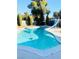 Inviting swimming pool with a slide in the backyard at 3690 S Rosecrest Cir, Las Vegas, NV 89121