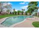 Beautiful backyard pool with a slide and meticulous landscaping creating a tranquil oasis at 3690 S Rosecrest Cir, Las Vegas, NV 89121