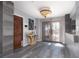 Elegant entryway with double doors, high ceilings, and modern floor tiles at 440 Probst, Las Vegas, NV 89110