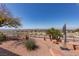 Landscaped yard with city views and modern art sculpture at 440 Probst, Las Vegas, NV 89110