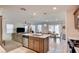 Modern kitchen with island, stainless steel appliances, and ample counter space at 5029 Bloodhound St, Las Vegas, NV 89122