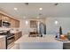 Modern kitchen island with a double sink and stainless steel appliances at 5029 Bloodhound St, Las Vegas, NV 89122