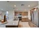 Modern kitchen with stainless steel appliances and an island at 5029 Bloodhound St, Las Vegas, NV 89122