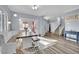 Bright dining area with built-in bench seating and hardwood floors at 952 Contadero Pl, Las Vegas, NV 89138