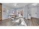 Sunlit dining area with built-in bench seating and hardwood floors at 952 Contadero Pl, Las Vegas, NV 89138