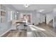 Well-lit dining area with a built-in bench and hardwood floors at 952 Contadero Pl, Las Vegas, NV 89138