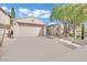 Single-story house with attached garage and landscaped front yard at 952 Contadero Pl, Las Vegas, NV 89138