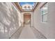 Inviting entryway with a walkway framed by decorative gravel leading to the front door at 952 Contadero Pl, Las Vegas, NV 89138