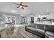 Open concept kitchen with white cabinets and stainless steel appliances at 952 Contadero Pl, Las Vegas, NV 89138