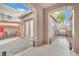 Inviting outdoor patio with brick flooring, covered seating, and access to the home at 952 Contadero Pl, Las Vegas, NV 89138