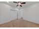 Simple bedroom with double doors and ceiling fan at 12253 Bluebird Canyon Pl, Las Vegas, NV 89138