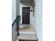 Private entrance with dark brown door and small balcony at 2615 W Gary Ave # 2090, Las Vegas, NV 89123