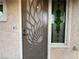 Exterior view of front door with decorative accents at 6437 Boatbill St, North Las Vegas, NV 89084