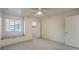 Bright bedroom with ceiling fan, window seat, and spacious closet at 2725 S Nellis Blvd # 1096, Las Vegas, NV 89121
