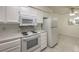 White kitchen with updated appliances and countertops at 2725 S Nellis Blvd # 1096, Las Vegas, NV 89121