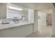 Kitchen features white cabinets and tile flooring at 2725 S Nellis Blvd # 1096, Las Vegas, NV 89121