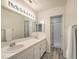 Double sink bathroom with large mirror and shower at 2725 S Nellis Blvd # 2096, Las Vegas, NV 89121