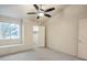 Bright bedroom with ceiling fan, window seat, and walk-in closet at 2725 S Nellis Blvd # 2096, Las Vegas, NV 89121