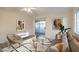 Virtually staged living room with sliding door to balcony at 2725 S Nellis Blvd # 2096, Las Vegas, NV 89121