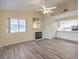 Open concept living room with kitchen and fireplace at 2725 S Nellis Blvd # 2096, Las Vegas, NV 89121