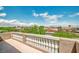 Relax on the balcony with views of the neighborhood and clear blue sky at 716 Solitude Point Ave, Henderson, NV 89012