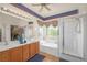 Bathroom features double sinks, soaking tub, and glass-enclosed shower, offering relaxation and convenience at 716 Solitude Point Ave, Henderson, NV 89012
