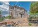 Charming townhome featuring well-maintained landscaping, stone accents and welcoming entrance at 716 Solitude Point Ave, Henderson, NV 89012