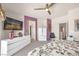 Spacious bedroom features a TV, ample storage, and stylish, modern decor throughout at 716 Solitude Point Ave, Henderson, NV 89012