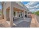 Cozy covered patio with ample seating, ideal for outdoor entertaining and relaxation at 716 Solitude Point Ave, Henderson, NV 89012