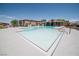 Community pool features a clear blue swimming area, lounge chairs, and a covered patio seating at 716 Solitude Point Ave, Henderson, NV 89012