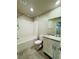 Clean white bathtub and vanity with granite countertop at 8279 Palladium St, Las Vegas, NV 89113