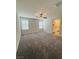 Bedroom featuring carpet, a ceiling fan, and windows for natural light at 8279 Palladium St, Las Vegas, NV 89113