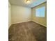 Neutral bedroom has wall to wall carpeting and bright window at 8279 Palladium St, Las Vegas, NV 89113
