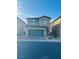 Charming two-story home with well-kept front yard and attached two-car garage at 8279 Palladium St, Las Vegas, NV 89113