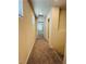 Carpeted upstairs hallway leads to bedroom at 8279 Palladium St, Las Vegas, NV 89113