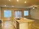 Kitchen featuring an island with granite countertops and stainless steel appliances at 8279 Palladium St, Las Vegas, NV 89113