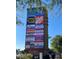A tall shopping center sign showcases various stores like Walmart, Home Depot, and Marshalls at 8279 Palladium St, Las Vegas, NV 89113