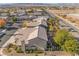 Aerial view of the house and neighborhood, showcasing mountain views at 8824 Prague Ct, Las Vegas, NV 89147