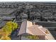 Aerial view of house, pool, and surrounding neighborhood at 8824 Prague Ct, Las Vegas, NV 89147