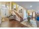 Elegant entryway with hardwood floors and a grand staircase at 8824 Prague Ct, Las Vegas, NV 89147