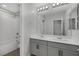 Bathroom boasts double vanity and shower/tub combo at 356 Espressivo St, Henderson, NV 89011