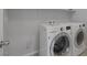 Laundry room with LG washer and dryer and shelving at 356 Espressivo St, Henderson, NV 89011