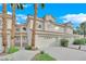 Two story home with attached garage and landscaping at 5404 Harmony Green Dr # 201, Las Vegas, NV 89149