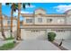 Two story home with attached garage and landscaping at 5404 Harmony Green Dr # 201, Las Vegas, NV 89149