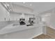 Renovated kitchen, featuring white cabinets and quartz countertops at 5404 Harmony Green Dr # 201, Las Vegas, NV 89149